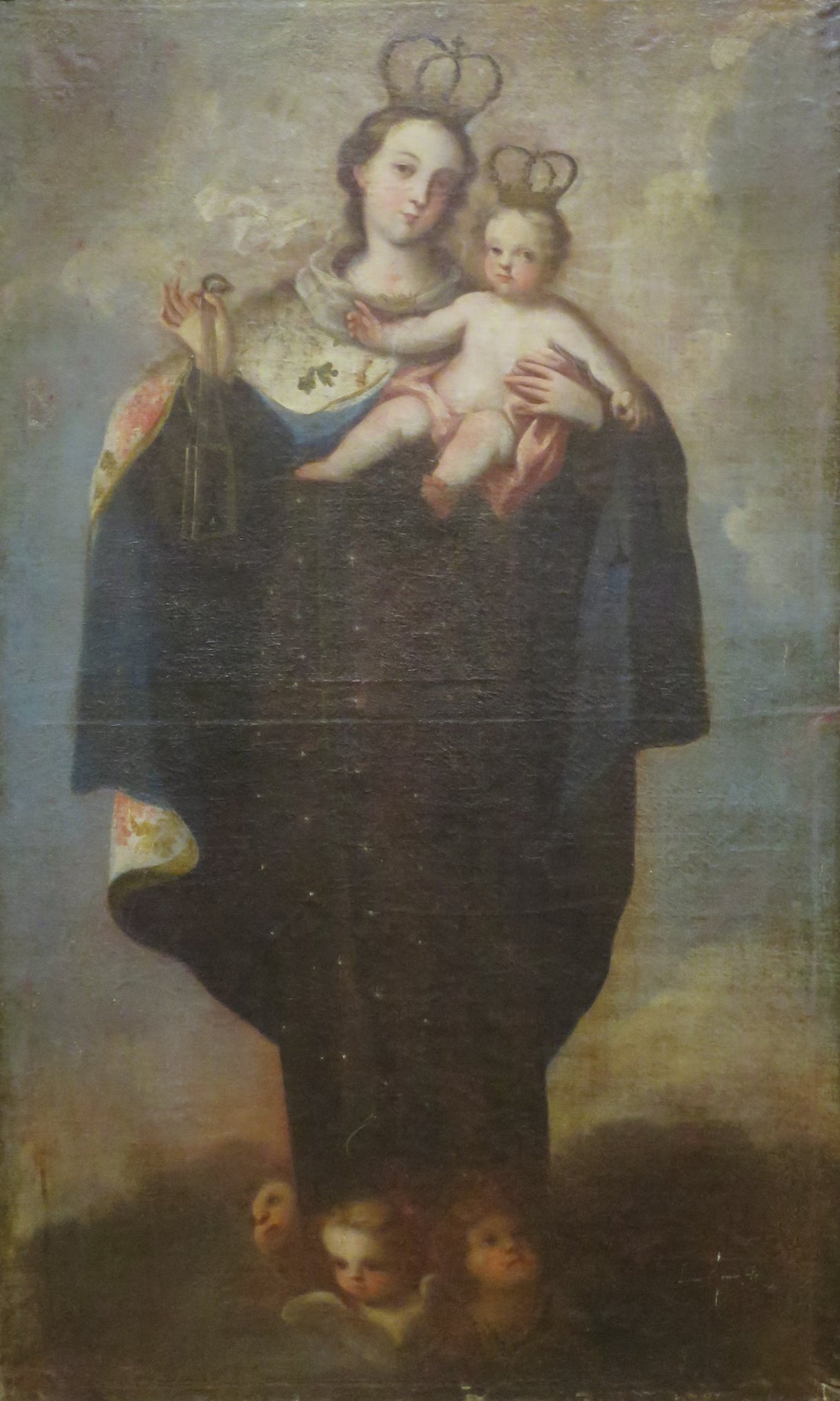 Pintura de la Virgen del Carmen con el Niño y el escapulario