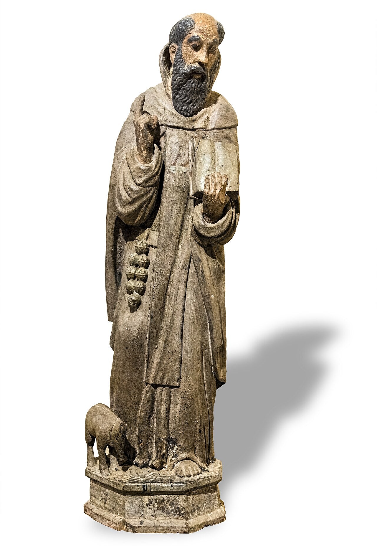 Escultura en madera policromada que representa a San Antonio Abad.