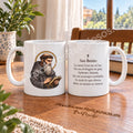 Both sides of our Saint Benedict mug, with illustration 1 in colour and the prayer in Spanish.